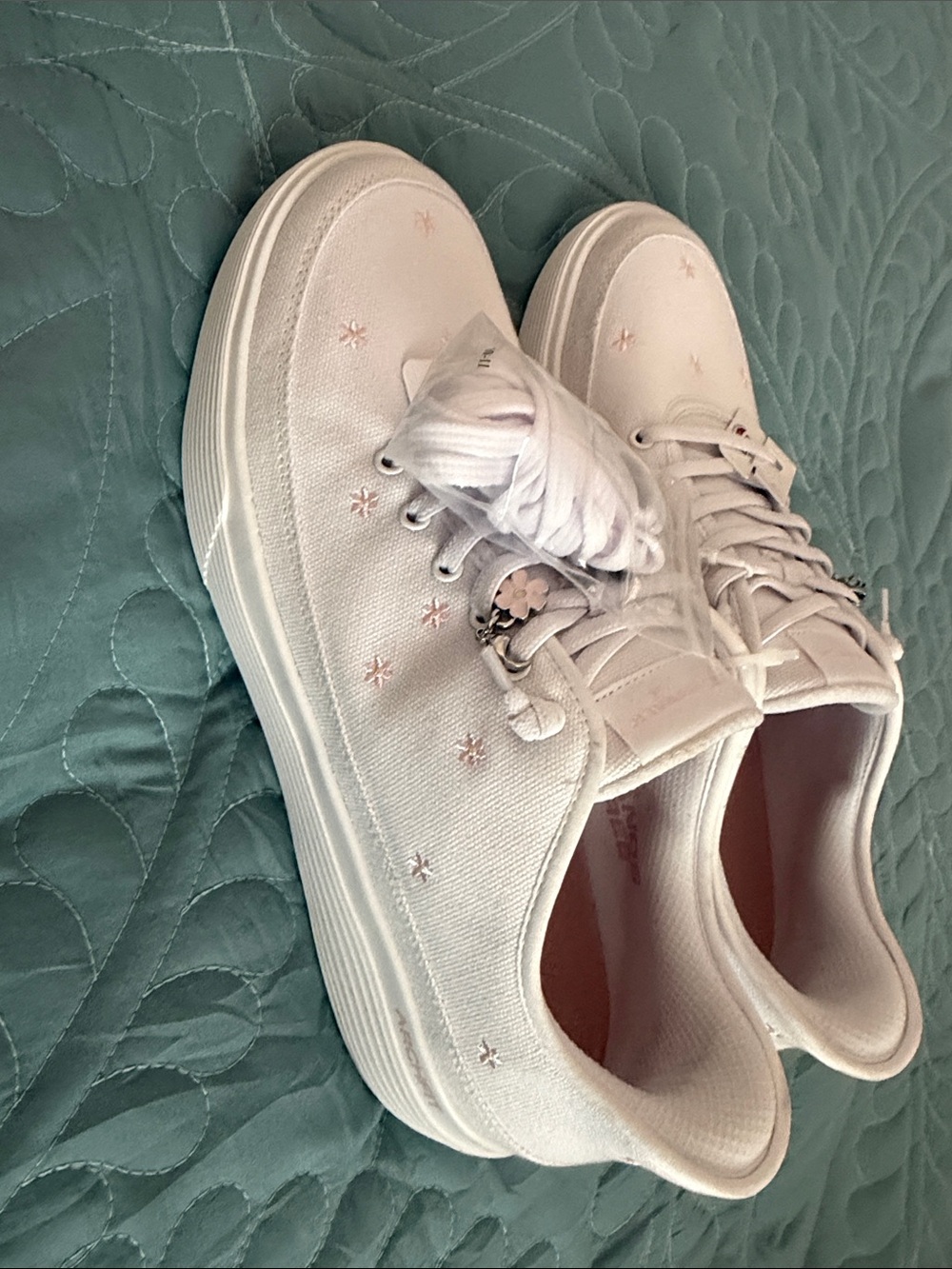 Skechers White Canvas Lace-Up Sneakers with Pink Star Accents